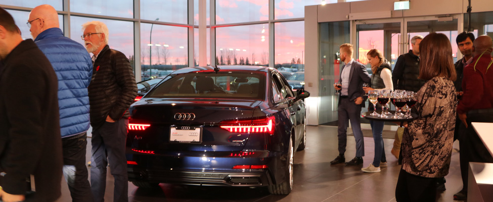 Guests admiring the new A,6, A7, A8, Q8 at the Audi Saskatoon launch event.