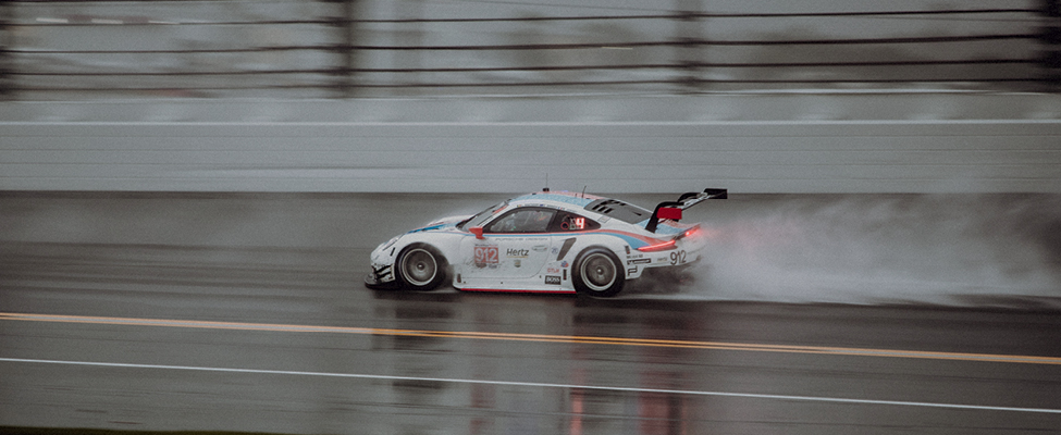 Porsche racing car in the rain 