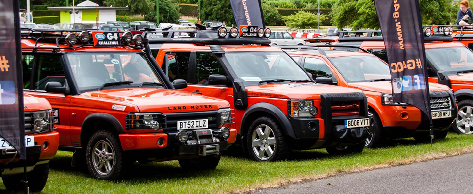 G4 Challenge Land Rovers at an event 