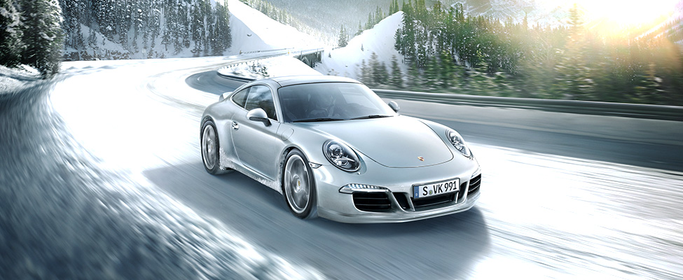 Porsche 911 on snowy road