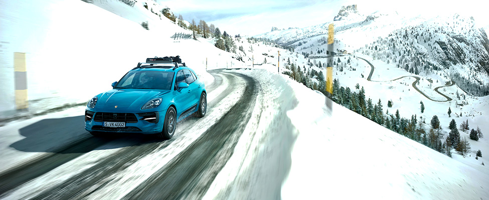 Porsche Macan on snowy road